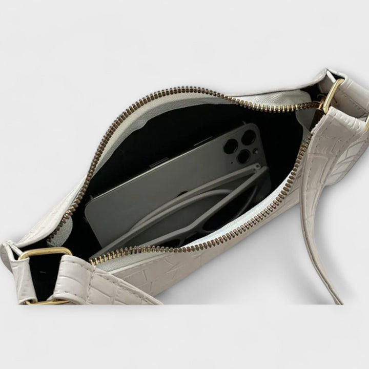 תיק עור מבריק הלורה - סגנון ופונקציונליות מושלמת